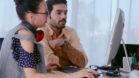 Creative Business People Group Having Conversation at Office Desk in Workplace