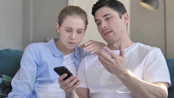 Online Loss, Upset Young Couple
