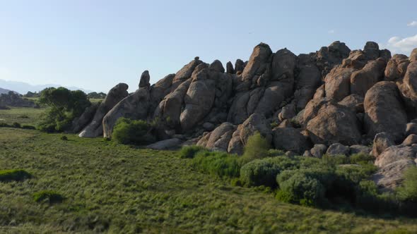 Scenic Nature Landscape at Sunset. Aerial of Rocks at the Green Meadows, USA