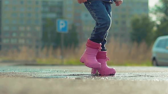 Close Up Kid in Wet Pants and Rubber