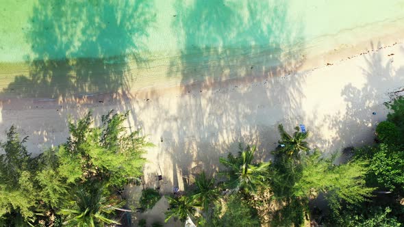 Natural aerial abstract view of a white sandy paradise beach and blue water background