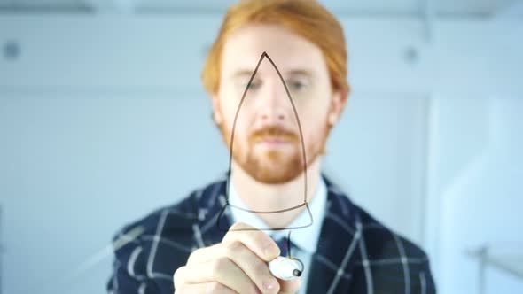 Creative Man Drawing Startup Rocket Concept on Transparent Glass, Red Hairs