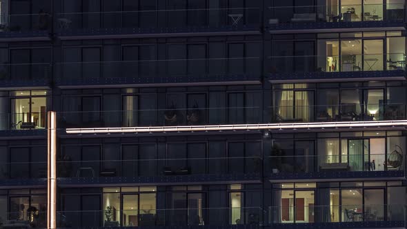 Flat Night Panorama of Multicolor Light in Windows of Multistory Buildings Aerial Timelapse