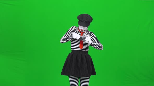 Mime Woman Is Acting Like She Is Photographer. Chroma Key.