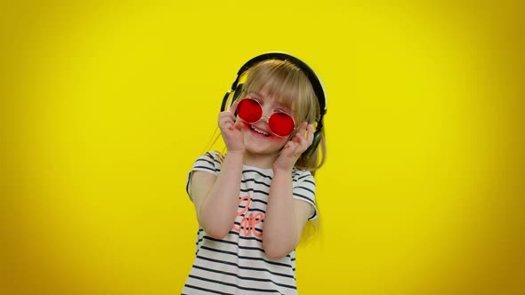 Funny Child Kid Girl Making Playful Silly Facial Expressions and Grimacing Fooling Showing Tongue