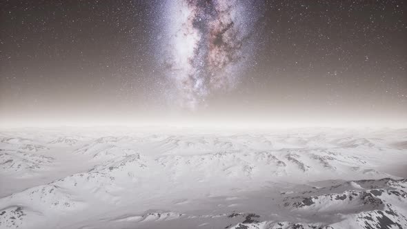 Milky Way Above Snow Covered Terrain alt