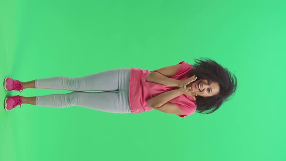 Portrait of Young Female African American Looking at the Camera with Wow Delight and Joy