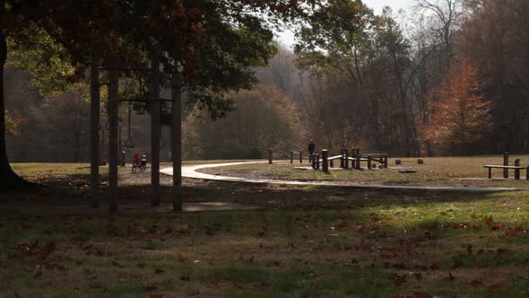Exercise Course and Bike Path with walker - Rock Creek Park - Washington, DC - Autumn