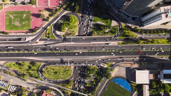 Overhead view over the main's highway of Santiago de Chile on a sunny day with cars in the backgroun