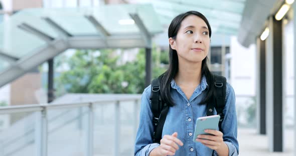 Woman Talk to Cellphone in The Evening 