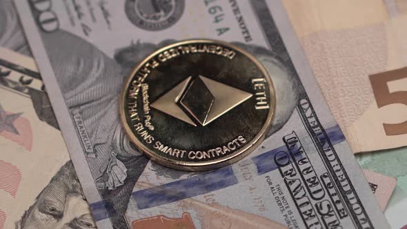 Ethereum ETH Cryptocurrency Coin on Dollars and Euros Banknotes, Future Banking