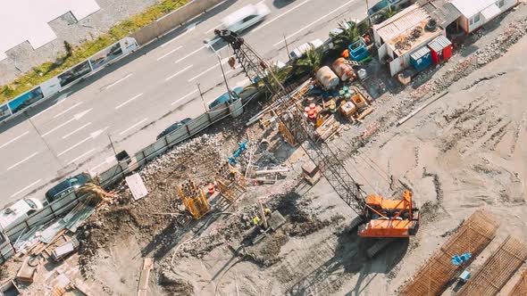 Workers Hammer Foundation Piles