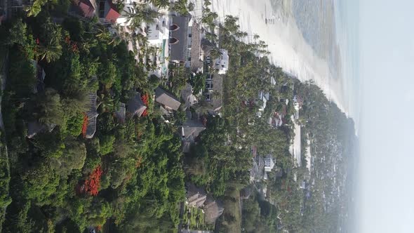 Vertical Video of the Ocean Near the Coast of Zanzibar Tanzania Aerial View