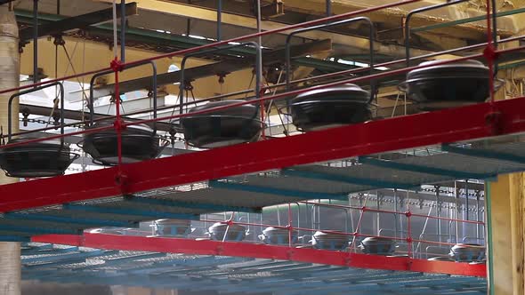 Tires on the Conveyor in the Tire Pressing Shop.