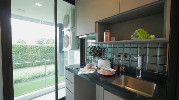Stylish Apartment or Condominium Kitchen Area Decoration Idea With Dark Tone Ceramic Tiles