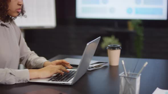 Female Office Worker With Laptop