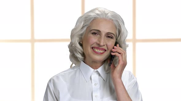 Close Up Friendly Mature Woman Talking on Phone