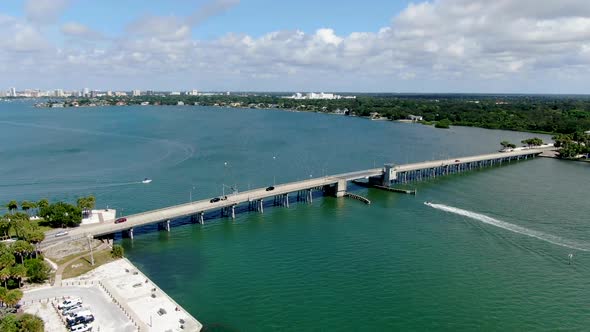 Aerial View of Street Bridge Crossing Ocean