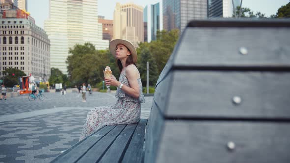 Attractive girl eating ice cream