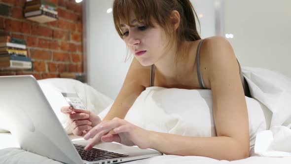 Online Shopping By Woman in Bed Payment By Credit Card