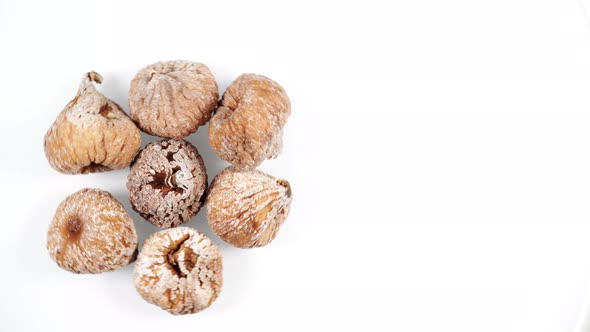 Dried Figs Fruit Rotating on White