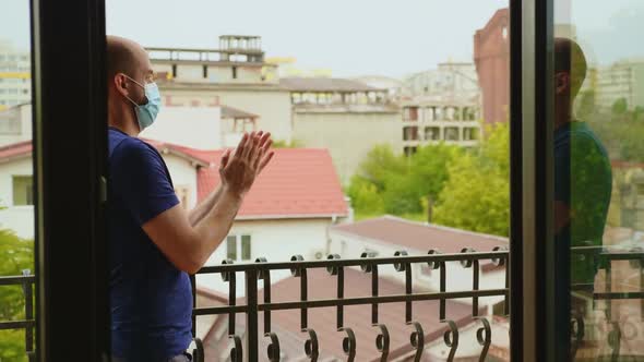 Ecstatic Man Applauding in Support for Medical Personal