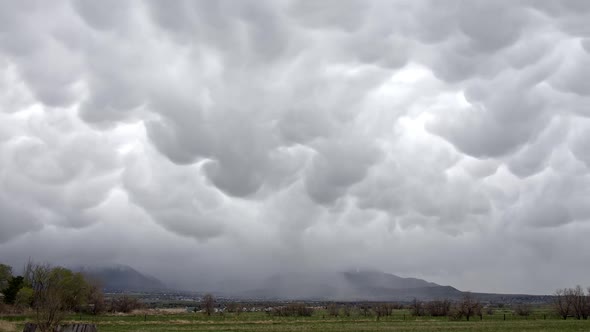 Time lapse of mammatus clouds during rainstorm alt