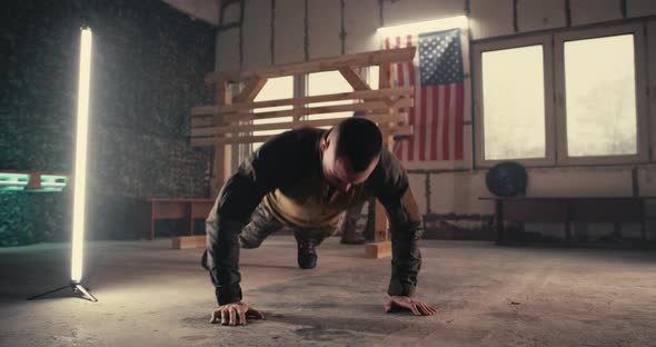 Male Soldier Doing Push Ups and Taking Break