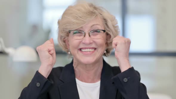 Portrait of Old Businesswoman Excited By Success Winning