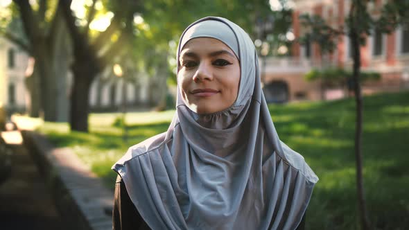 Muslim Woman in Gray Hijab