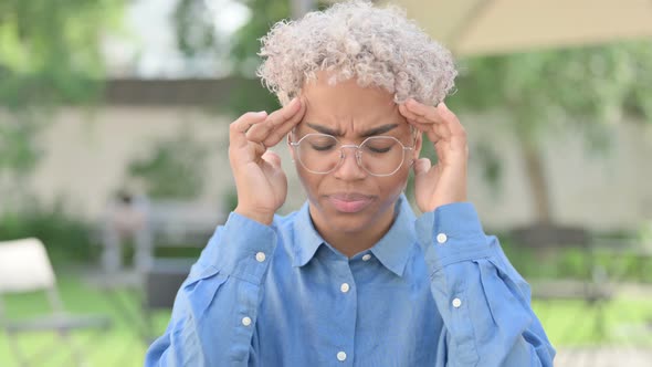 Portrait of Young African Woman Having Headache