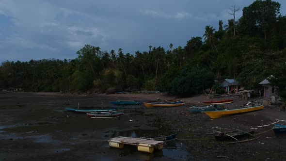 Aerial view of fishing boats out side a small village