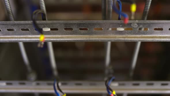 Slider Shot of a Blank Metal DIN Rails in Workshop Laboratory