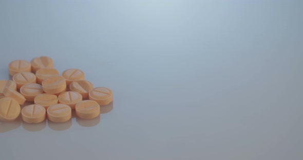 Prescription drugs - Capsules, pills, tablets on reflective background