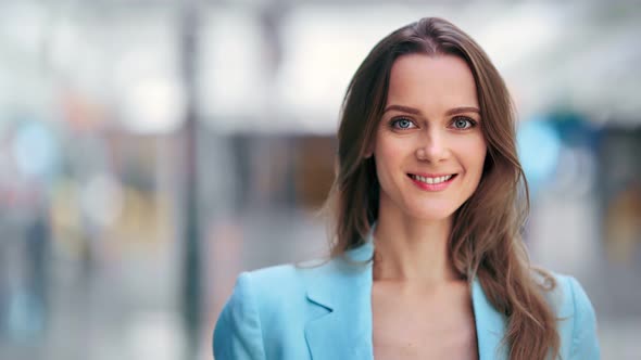 Closeup Young Businesswoman Posing at Modern Glass Office