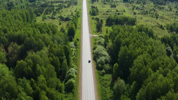 Aerial View of a Traveler's Car on the Road