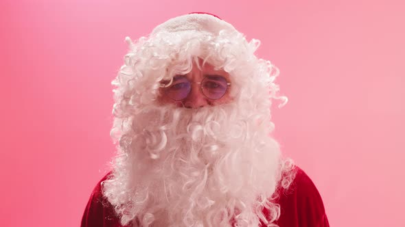 Santa Claus Portrait Standing on Red Background