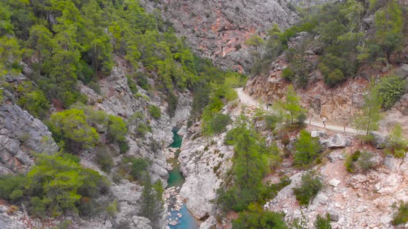 Flying Among Rocky Mountains in a Deep Prehistoric Gorge