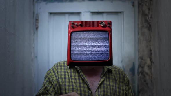 TV with Static Noise on the Head of a Man. TV Addiction Concept.