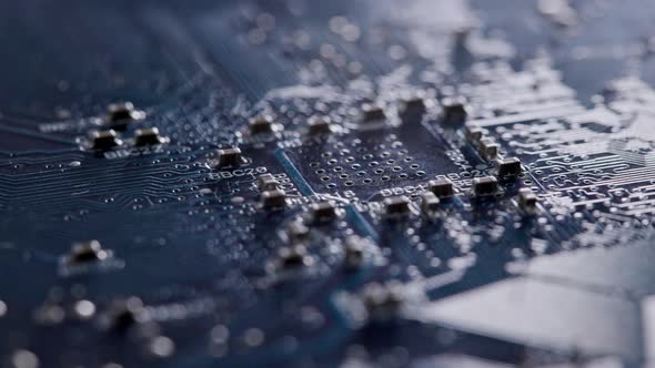 Computer Electronic Circuit Board with Radial Conductor Tracks and SMD Capacitors Rotating Macro