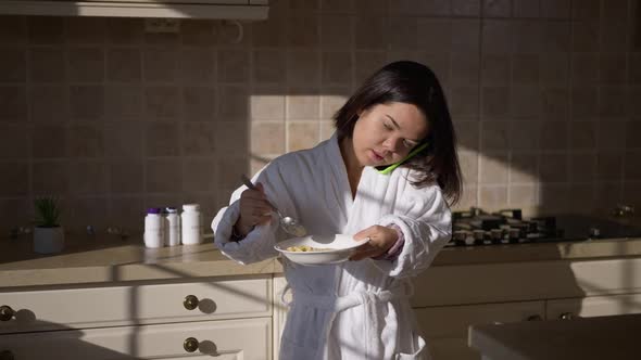 Hurrying Little Woman Entering Kitchen Eating Morning Cereals Leaving Talking on Phone