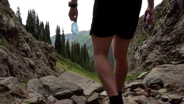 Guy in the Mountains Takes Off His Medical Mask.