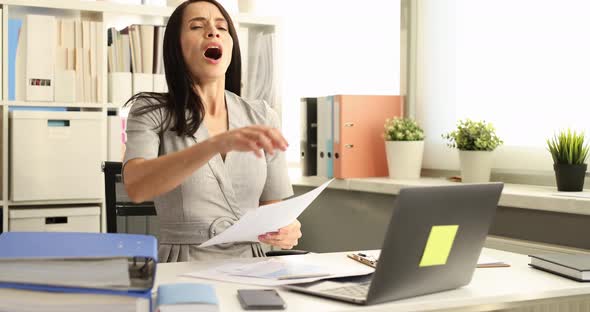 Young Woman Working at Workplace Sneezes Violently  Movie
