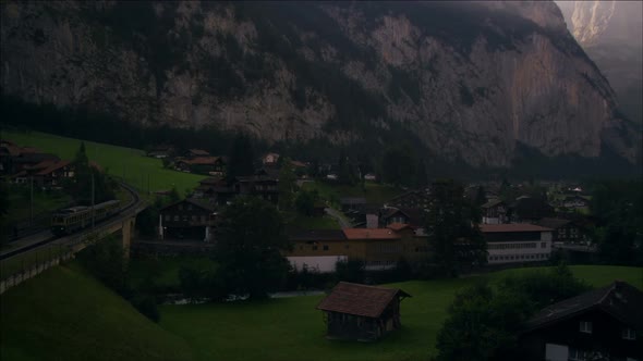 Paning shot of Lauterbrunnen, Switzerland at dawn