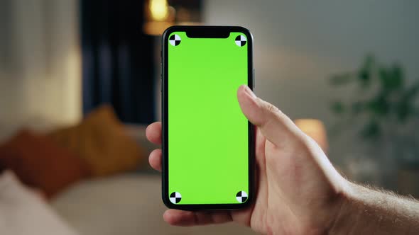 Man Using Smartphone with Chroma Key Closeup