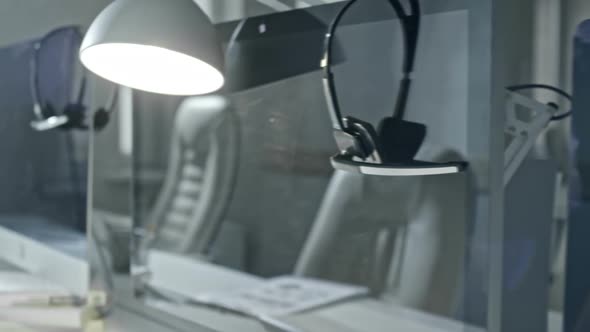 Computer Monitors on Desks in Empty Office