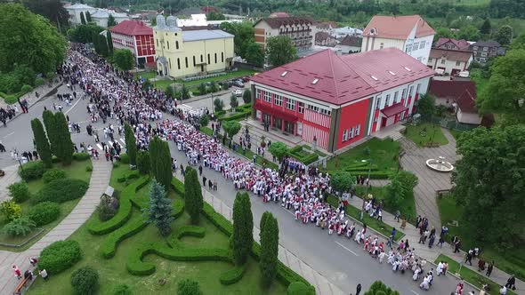 Aerial view of people in traditional clothes