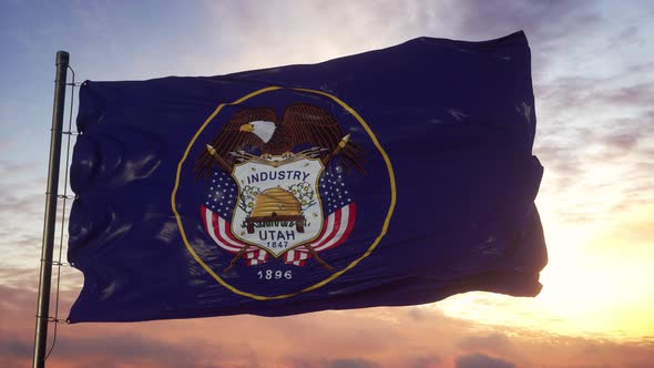 Flag of Utah Waving in the Wind Against Deep Beautiful Sky at Sunset