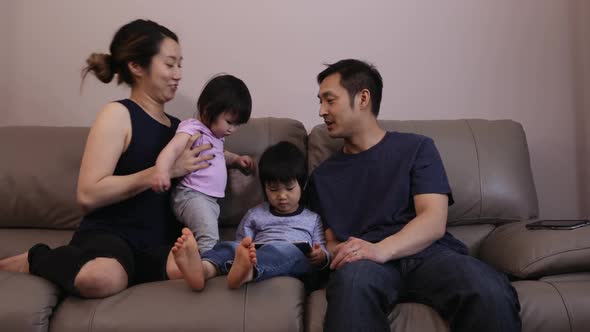 Family enjoying time relaxing together at home