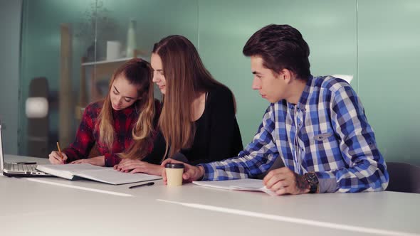 Group of Young People on the Meeting in Modern Apartment